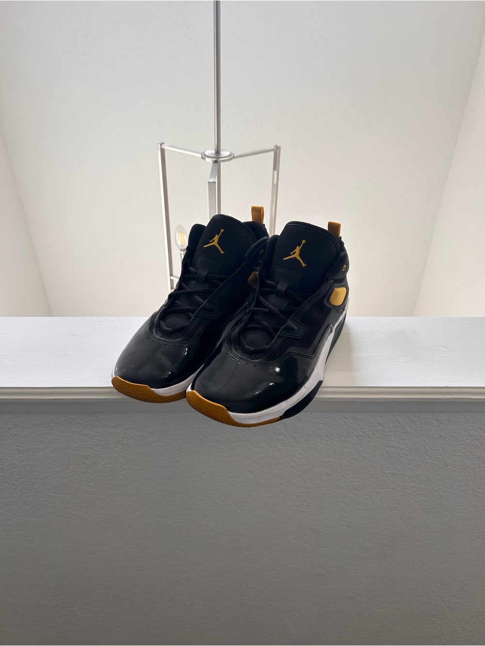 Jordan Men’s Black and Gold High-Top Athletic Basketball Shoes